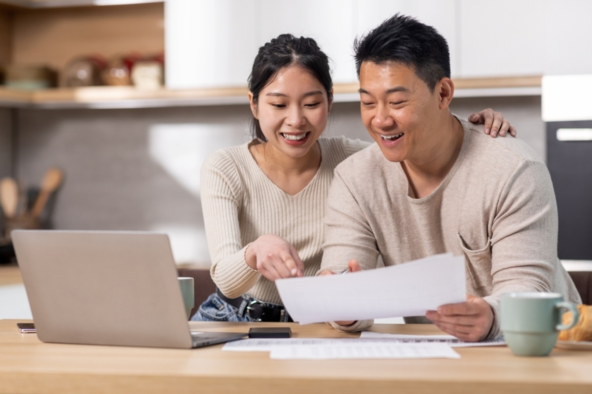 A couple looking at documents together