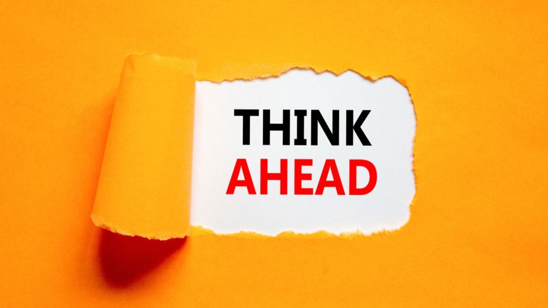 The words “think ahead” on an orange background